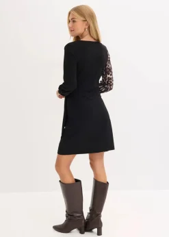 Figurbetontes Minikleid mit tiefem Ausschnitt