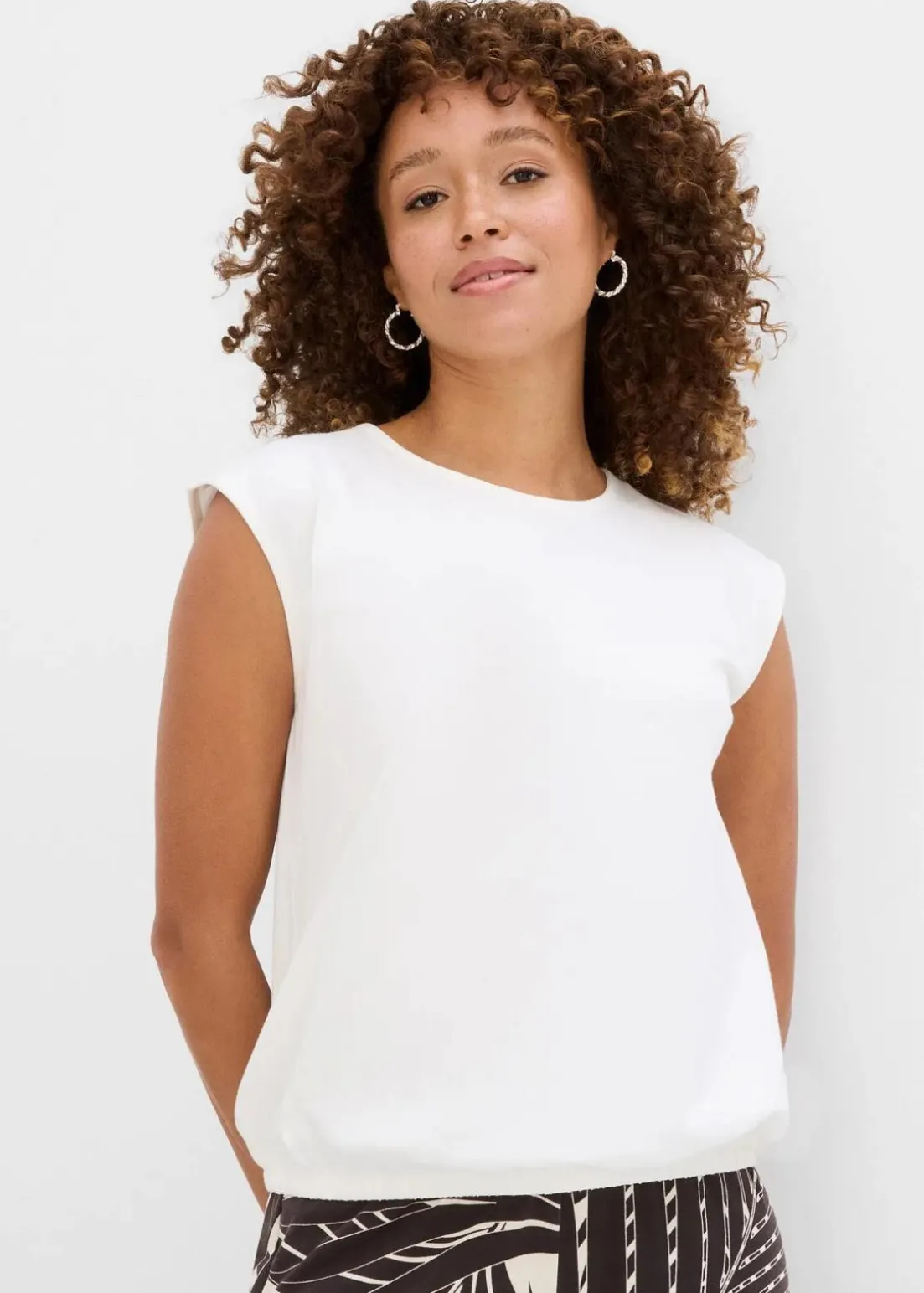 Shirt mit elastischem Bündchen